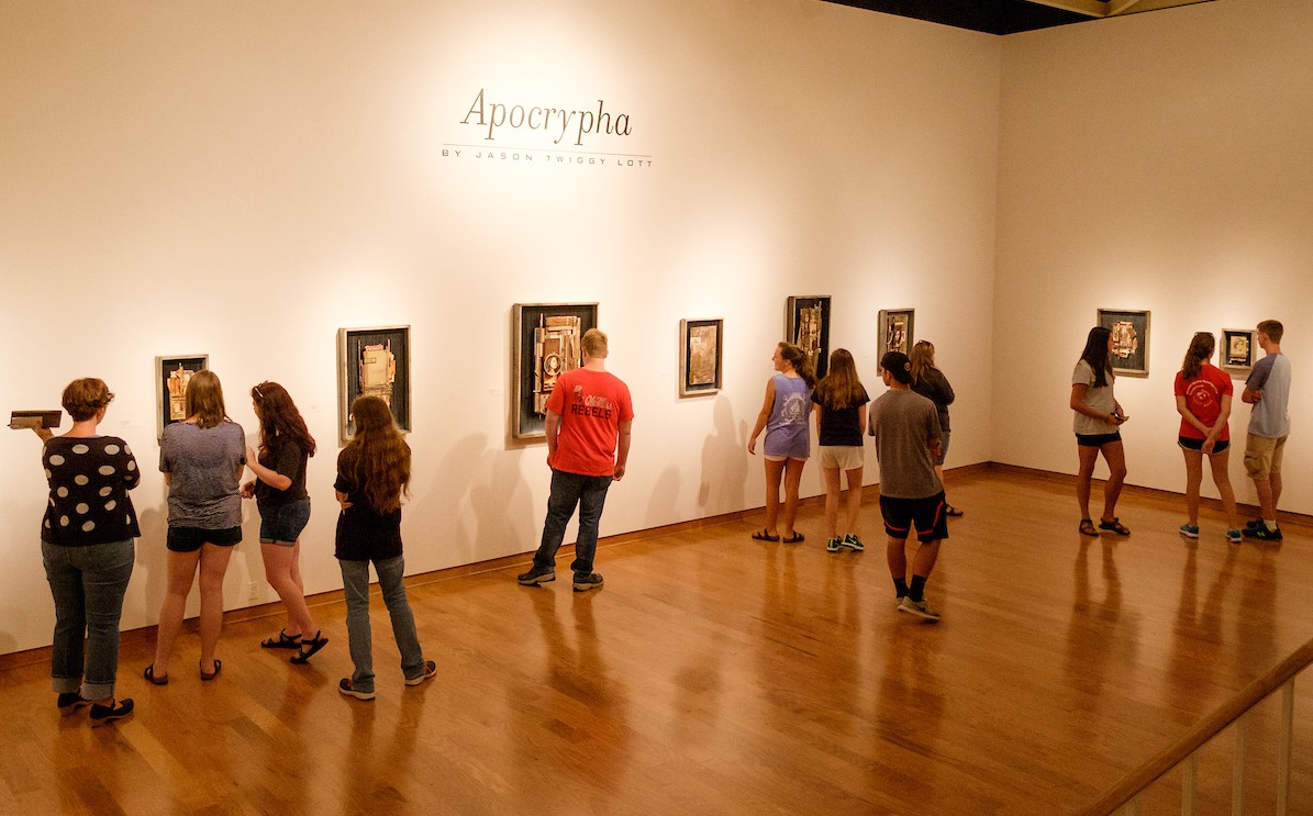 Students viewing art in the UM Museum gallery.